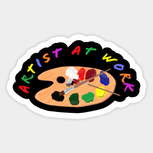 Artist at Work. Wooden Artist Palette with Colorful Paints and Brushes. Multicolored Lettering. Black Background. Sticker